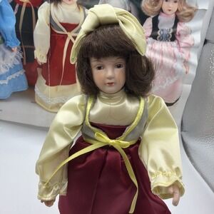 Russ International Dolls Monique France Style 1616 porcelain doll. Preowned.